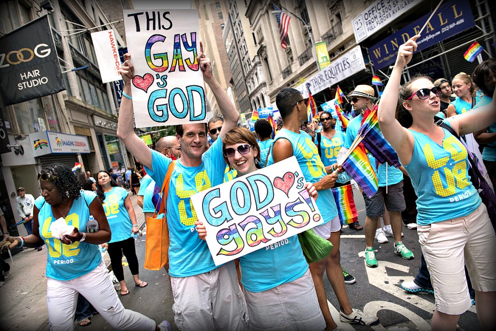 Pro-LGBTQ Christian group Believe Out Loud marched with the Collegiate Churches of New York & Intersections International to spread the message of God's expansive love at the2013  NYC Pride March through one simple slogan: "Love Period." Photo by Angela Jimenez via Creative Commons/Flickr. 