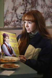 Claire Jennings (Holly Taylor) reads a copy of "Girls World" with the character Jo from the popular '80s TV show "The Facts of Life" on the cover in an episode of FX's "The Americans." 