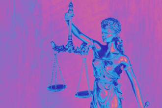 blind justice statue in trans flag colors