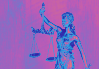blind justice statue in trans flag colors
