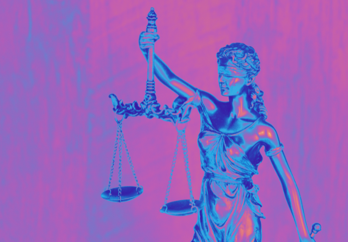 blind justice statue in trans flag colors