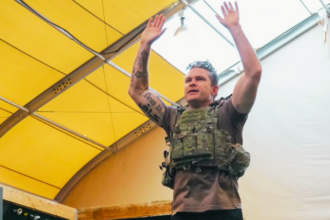 Secretary of Defense Hesgeth's racist tattoo on display