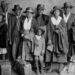 "Scott and Violet Arthur arrive with their family at Chicago's Polk Street Depot on Aug. 30, 1920, two months after their two sons were lynched in Paris, Texas. The picture has become an iconic symbol of the Great Migration. (Chicago History Museum)"